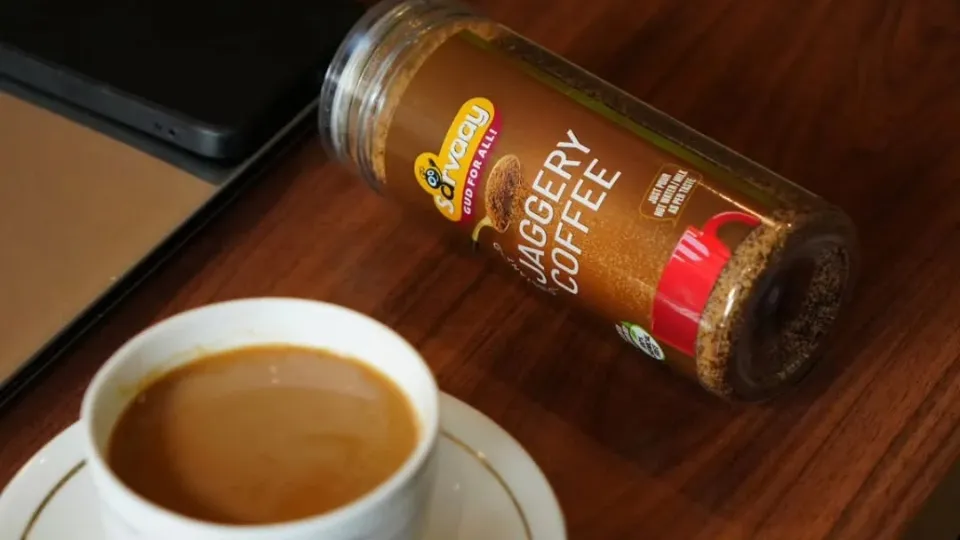 Sarvaay Jaggery Coffee with a cup of coffee
